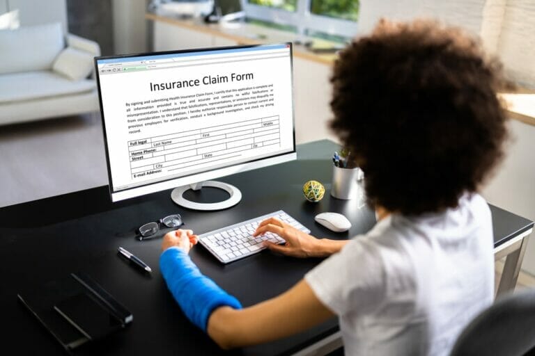 Broken Arm Injured Worker Compensation Coverage. Using Office Laptop